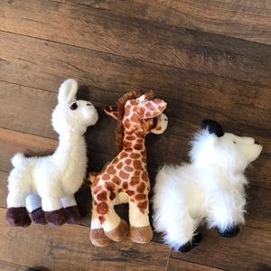 Three webkinz: llama, giraffe, and mountain goat